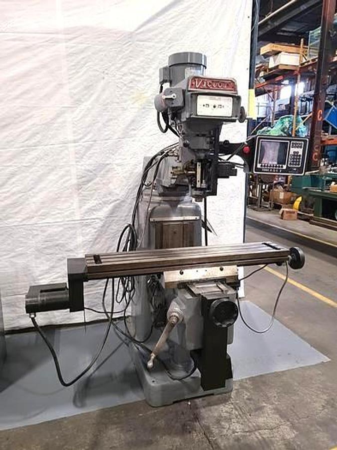 Used VICTOR / PROTOTRAK 2-AXIS CNC VERTICAL MILL – 49" TABLE – VARIABLE SPEED – PROTOTRAK PLUS CONTROL – REFURBISHED / USB UPGRADE – POWER QUILL – AUTO LUBE – EXCELLENT CONDITION
