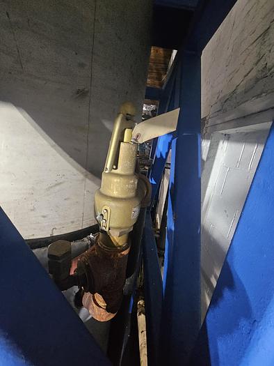 Used 150 Gallon Stainless Steel Pressure Vessel with stand and valves