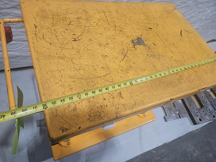 Used Hydraulic Post Lift Table 2000 Lb Capacity 59 Inch Raised Height Table is 24x36 Inch 