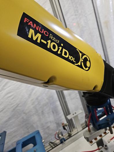 Used  AES Robotic Custom Packaging Machine Automated Robot Packaging with Conveyor