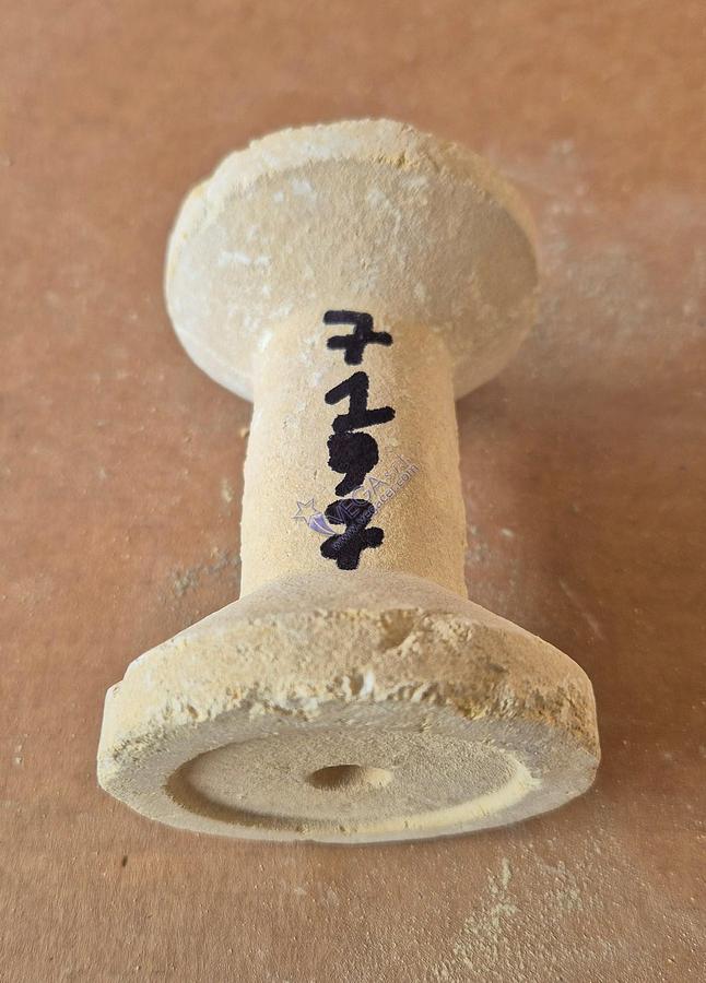 Usato Spool-shaped refractory column