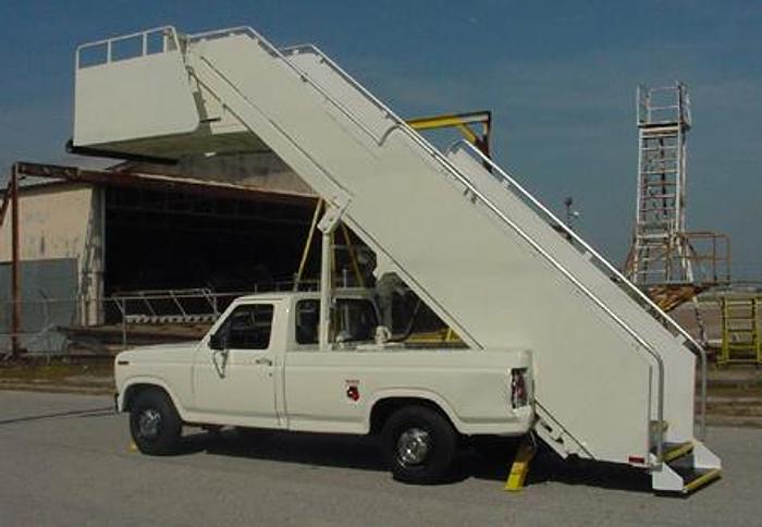Used Stinar (Wide body aircraft stairs) Model #SPS2513
Mounted on 1981 Ford F-250 Truck