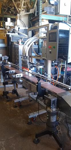 Refurbished Filling Express 6 head pressure gravity filler