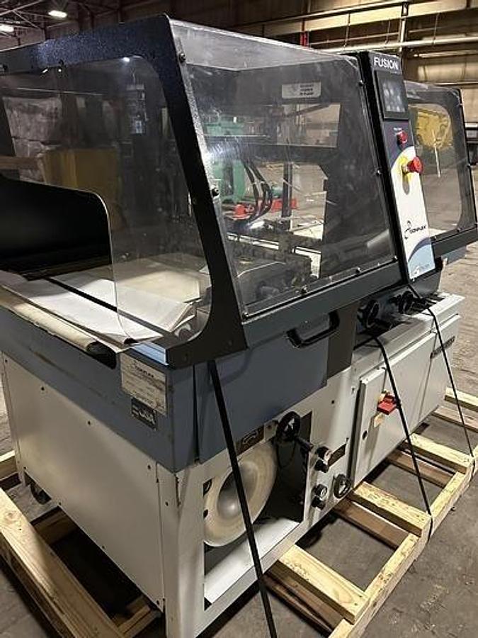 Used CONFLEX FUSION SIDE SEAL SHRINK WRAPPER OPERATING SPEED 100 FEET PER MINUTE