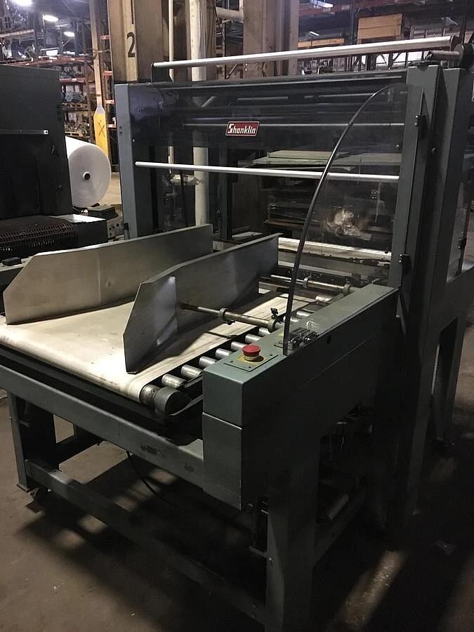 Used SHANKLIN SHRINK BUNDLING SYSTEM WITH 40" SHANKLIN MODEL B-2B SLEEVE WRAPPER