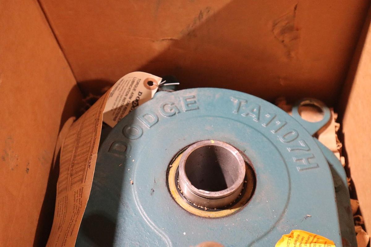 Used Dodge TA1107H31 Shaft Mount Gear 6.01hp 30.9:1 Torque-Arm II Speed Reducer NEW