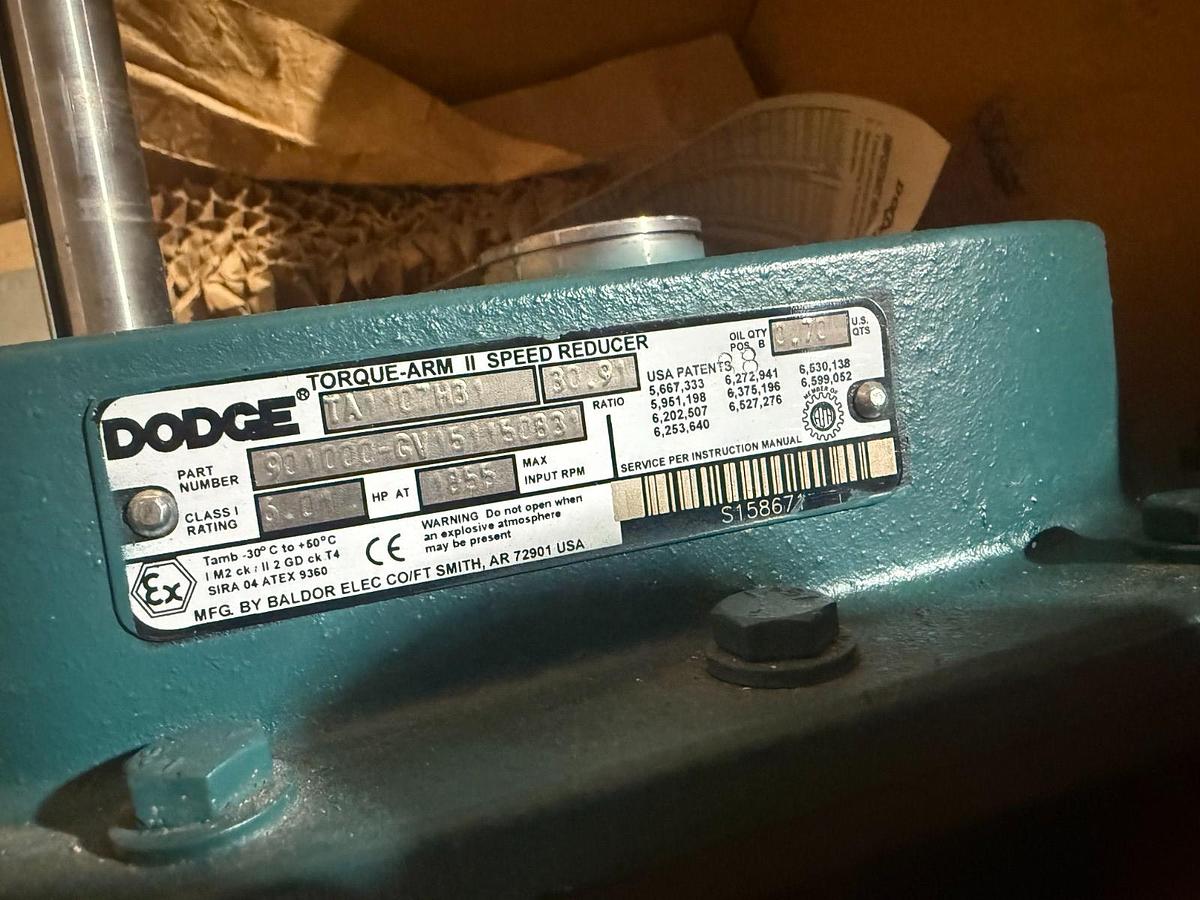 Used Dodge TA1107H31 Shaft Mount Gear 6.01hp 30.9:1 Torque-Arm II Speed Reducer NEW
