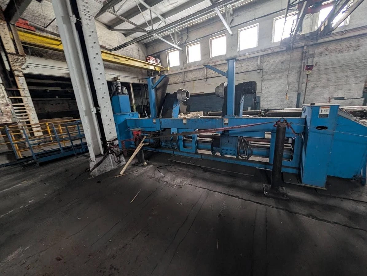 Used 98" WIDE MARQUIP 84" DIAMETER SHAFTLESS FLOOR PICKUP UNWIND STAND BACKSTAND