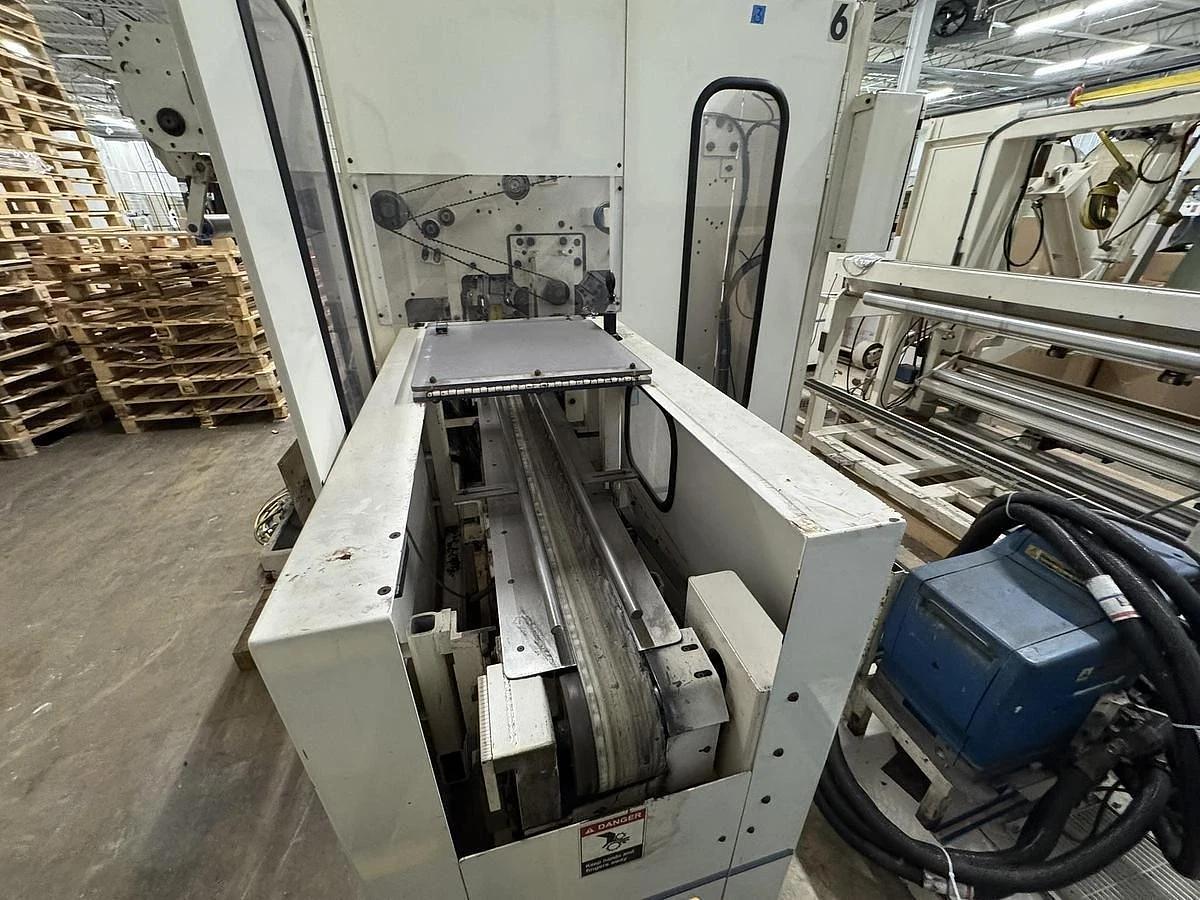 Used 42" WIDE ELSNER ENR-1000 AUTOMATIC REWINDER FOR NONWOVEN WIPES 10" REWIND DIA.