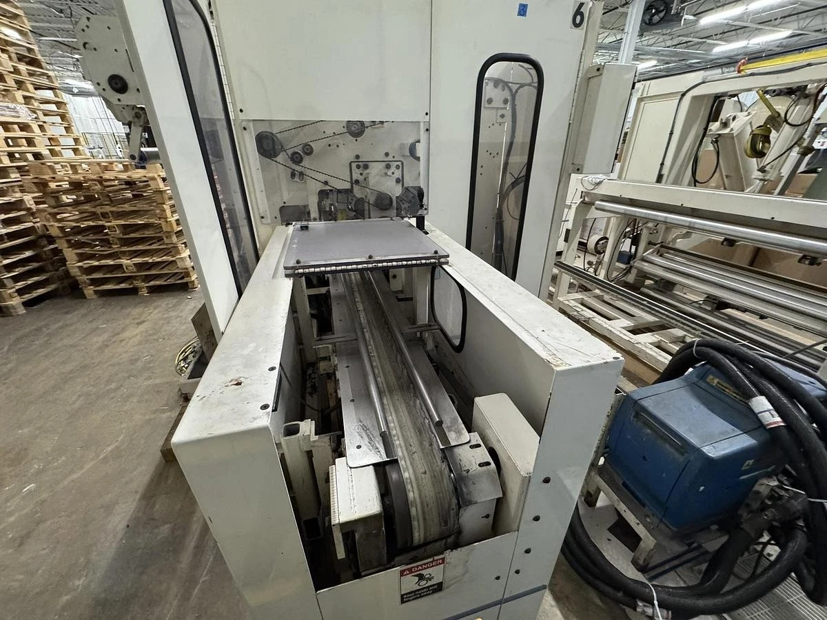 Used 42" WIDE ELSNER ENR-1000 AUTOMATIC REWINDER FOR NONWOVEN WIPES 10" REWIND DIA.