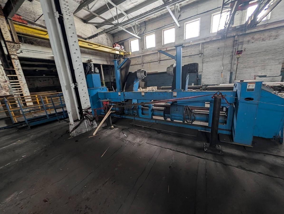 Used 98" WIDE MARQUIP 84" DIAMETER SHAFTLESS FLOOR PICKUP UNWIND STAND BACKSTAND