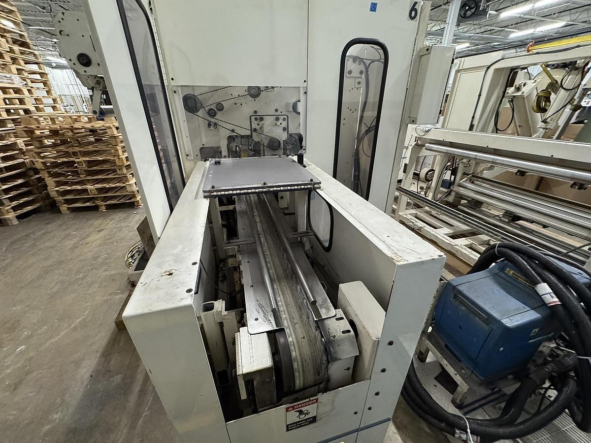 Used 42" WIDE ELSNER ENR-1000 AUTOMATIC REWINDER FOR NONWOVEN WIPES 10" REWIND DIA.