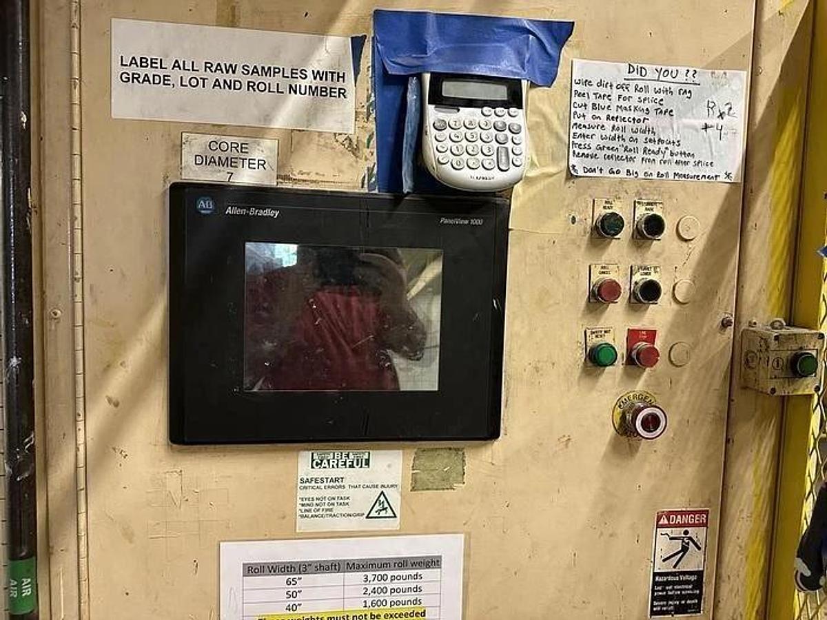 Used 63" BLACK CLAWSON TURRET UNWIND 48" DIAMETERS WITH AUTOMATIC SPLICER