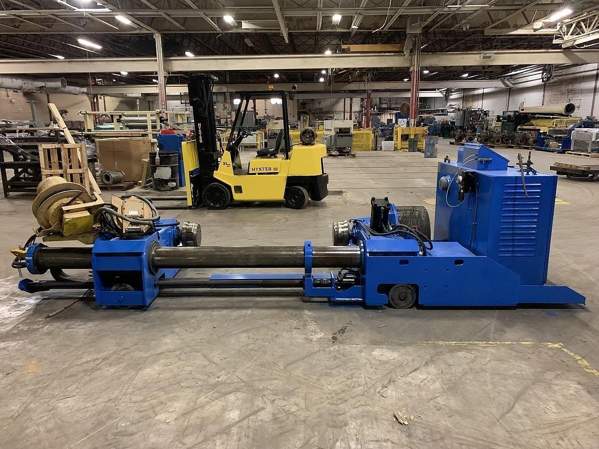 Used 65" JAGENBERG MODEL SE-18 SHAFTLESS FLOOR PICK UP UNWIND STAND 72" ROLL DIAMETER