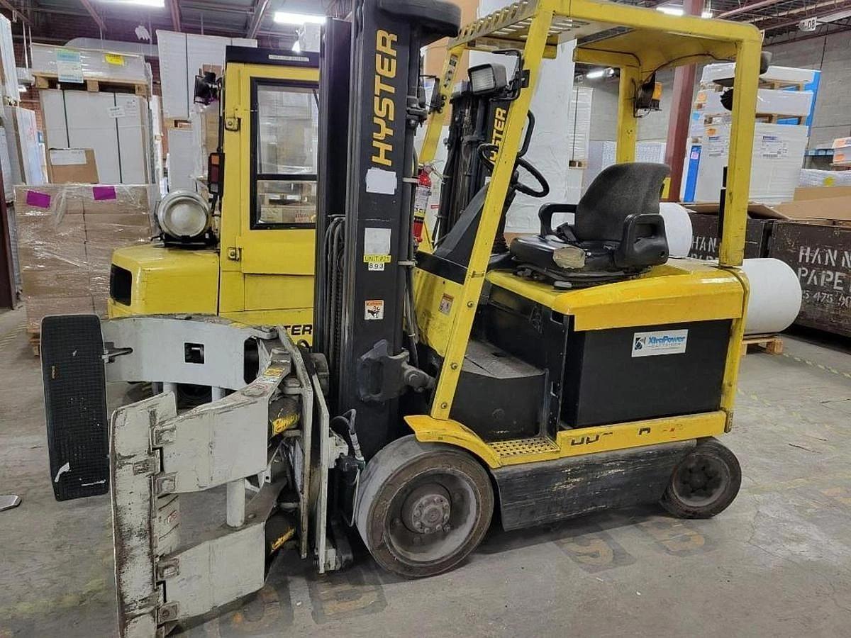 Used 6,000 LB. HYSTER FORKLIFT MDL E60XLS RH189" WITH CASCADE ROLL CLAMP AND CHARGER