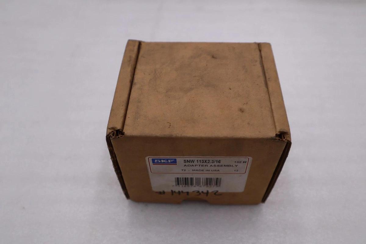 Used NEW IN BOX - SKF SNW113X2.3/16 BEARING ADAPTER SLEEVE - STOCK 5609CC