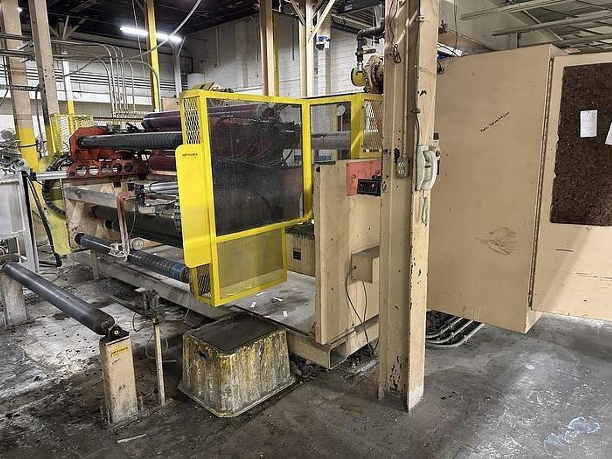 Used 63" BLACK CLAWSON TURRET UNWIND 48" DIAMETERS WITH AUTOMATIC SPLICER