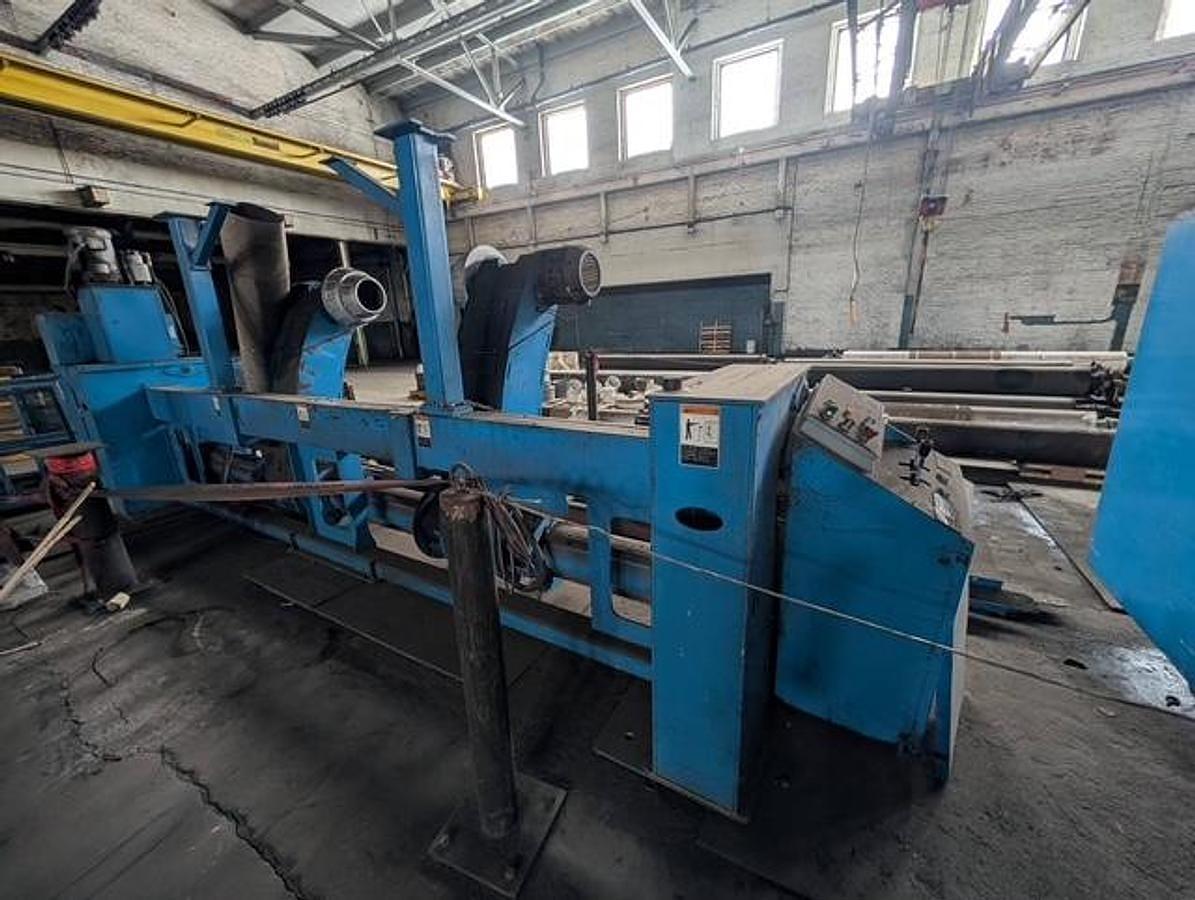 Used 98" WIDE MARQUIP 84" DIAMETER SHAFTLESS FLOOR PICKUP UNWIND STAND BACKSTAND