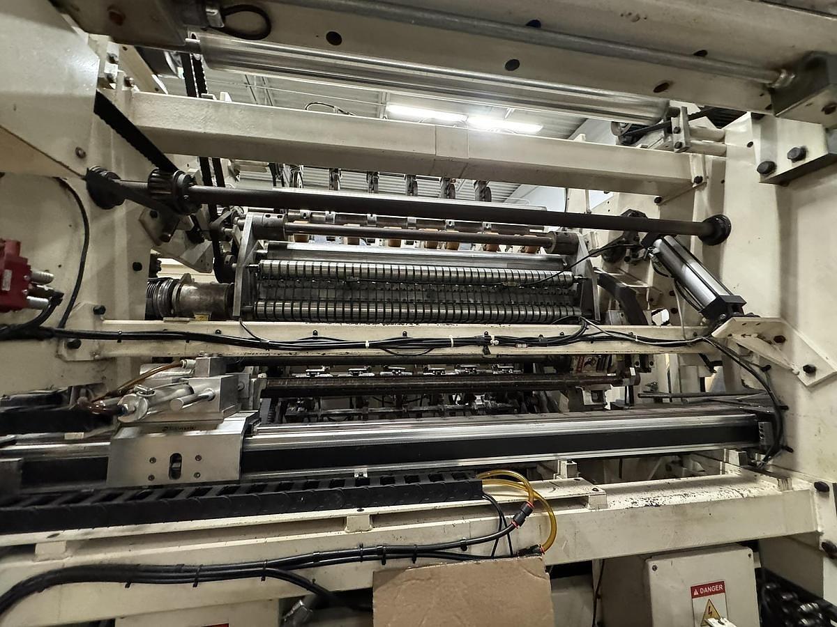 Used 42" WIDE ELSNER ENR-1000 AUTOMATIC REWINDER FOR NONWOVEN WIPES 10" REWIND DIA.