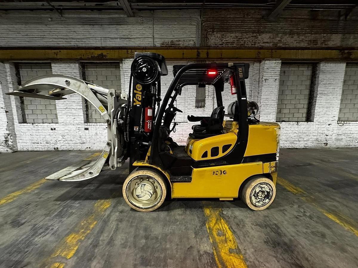 Used 15,500 POUND YALE MODEL GLC155VX FORKLIFT WITH 84" CASCADE PAPER ROLL CLAMP LOW