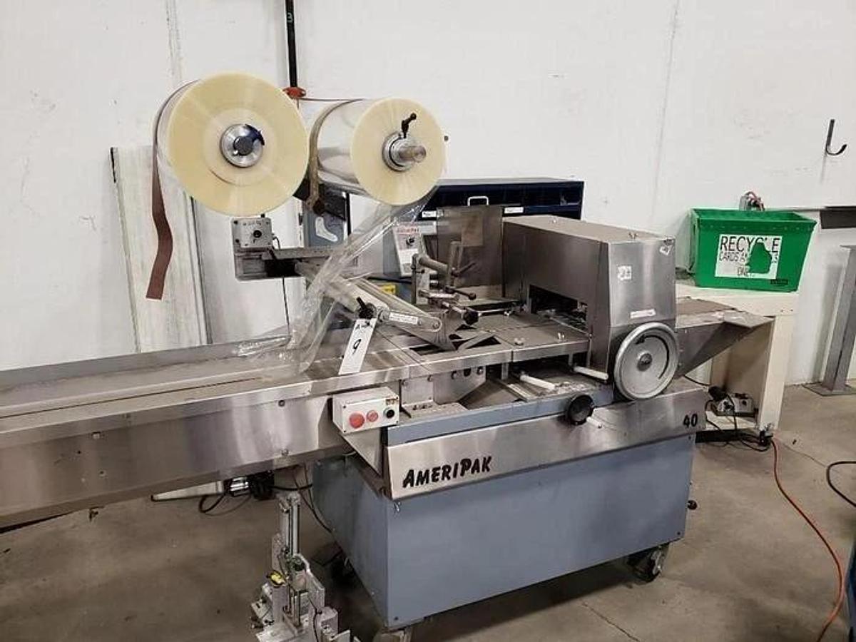 Used AMERIPAK # 40 HORIZONTAL WRAPPER w/ 10’ SS LUGGED INFEED CONVEYOR