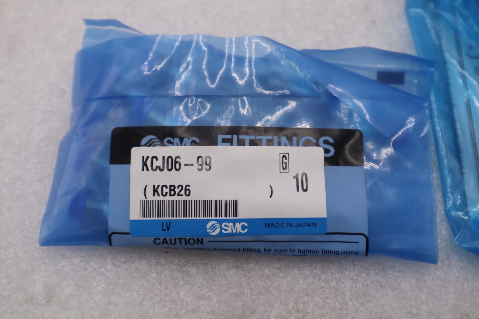 Used New OPEN BOX SMC self-sealing connector KCJ06-99 STOCK K-2571