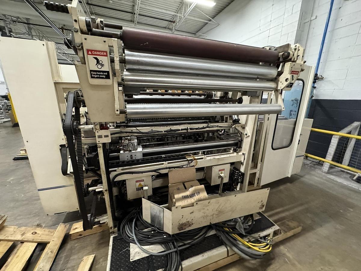 Used 42" WIDE ELSNER ENR-1000 AUTOMATIC REWINDER FOR NONWOVEN WIPES 10" REWIND DIA.