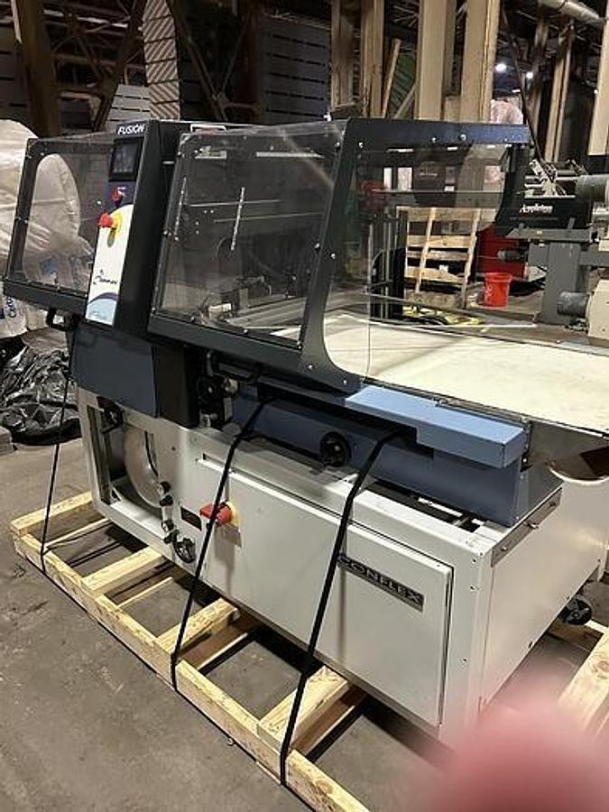 Used CONFLEX FUSION SIDE SEAL SHRINK WRAPPER OPERATING SPEED 100 FEET PER MINUTE