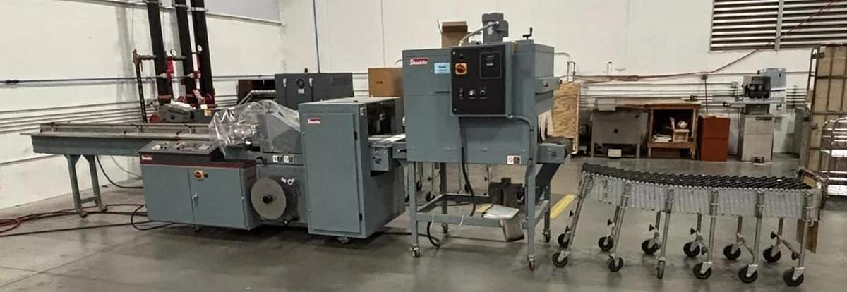 Used SHANKLIN MDL. F-5A AUTOMATIC SIDE SEAL SHRINK WRAPPER SYSTEM