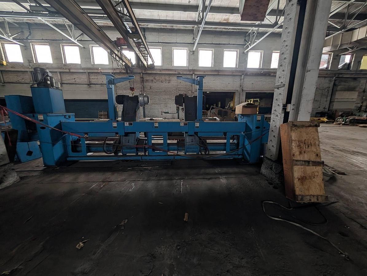 Used 98" WIDE MARQUIP 84" DIAMETER SHAFTLESS FLOOR PICKUP UNWIND STAND BACKSTAND