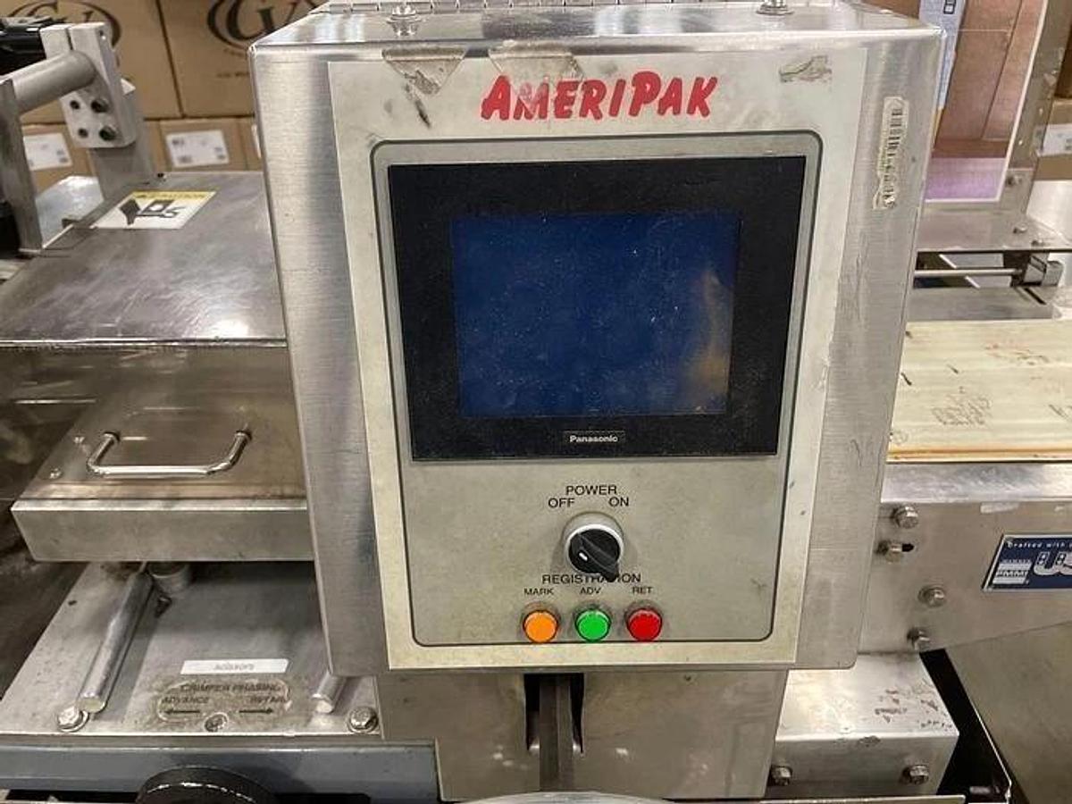 Used AMERIPAK # 40 HORIZONTAL WRAPPER w/ 6’ SS LUGGED INFEED CONVEYOR
