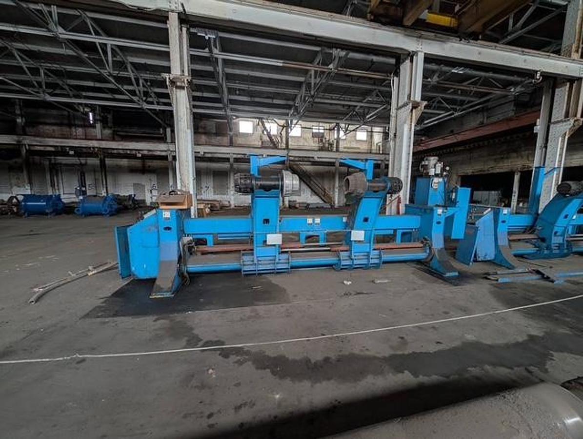 Used 98" WIDE MARQUIP 84" DIAMETER SHAFTLESS FLOOR PICKUP UNWIND STAND BACKSTAND
