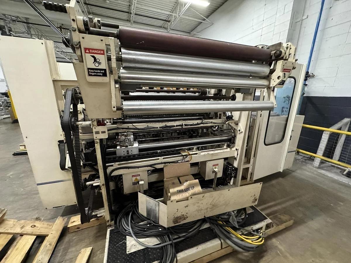 Used 42" WIDE ELSNER ENR-1000 AUTOMATIC REWINDER FOR NONWOVEN WIPES 10" REWIND DIA.