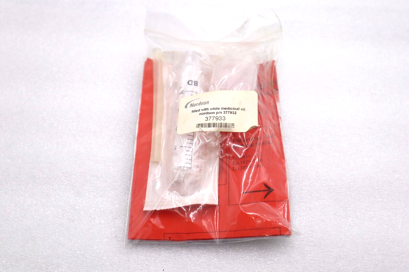NEW NORDSON 377932 FILLED W/ WHITE MEDICINAL OIL #L-477