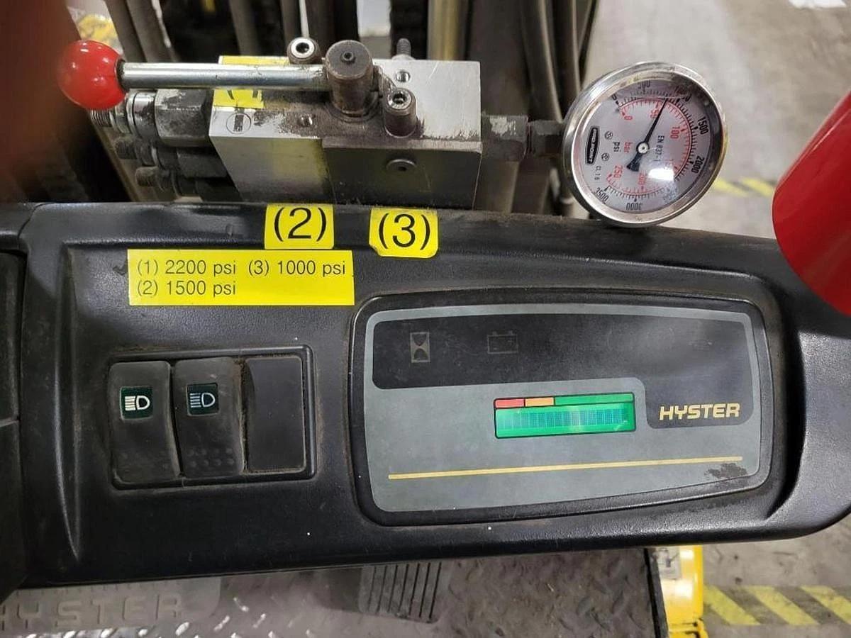 Used 6,000 LB. HYSTER FORKLIFT MDL E60XLS RH189" WITH CASCADE ROLL CLAMP AND CHARGER