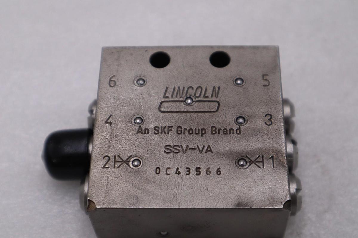 Used LINCOLN SKF SSV-VA 0C43566 DIVIDER VALVE BLOCK STOCK H1032A