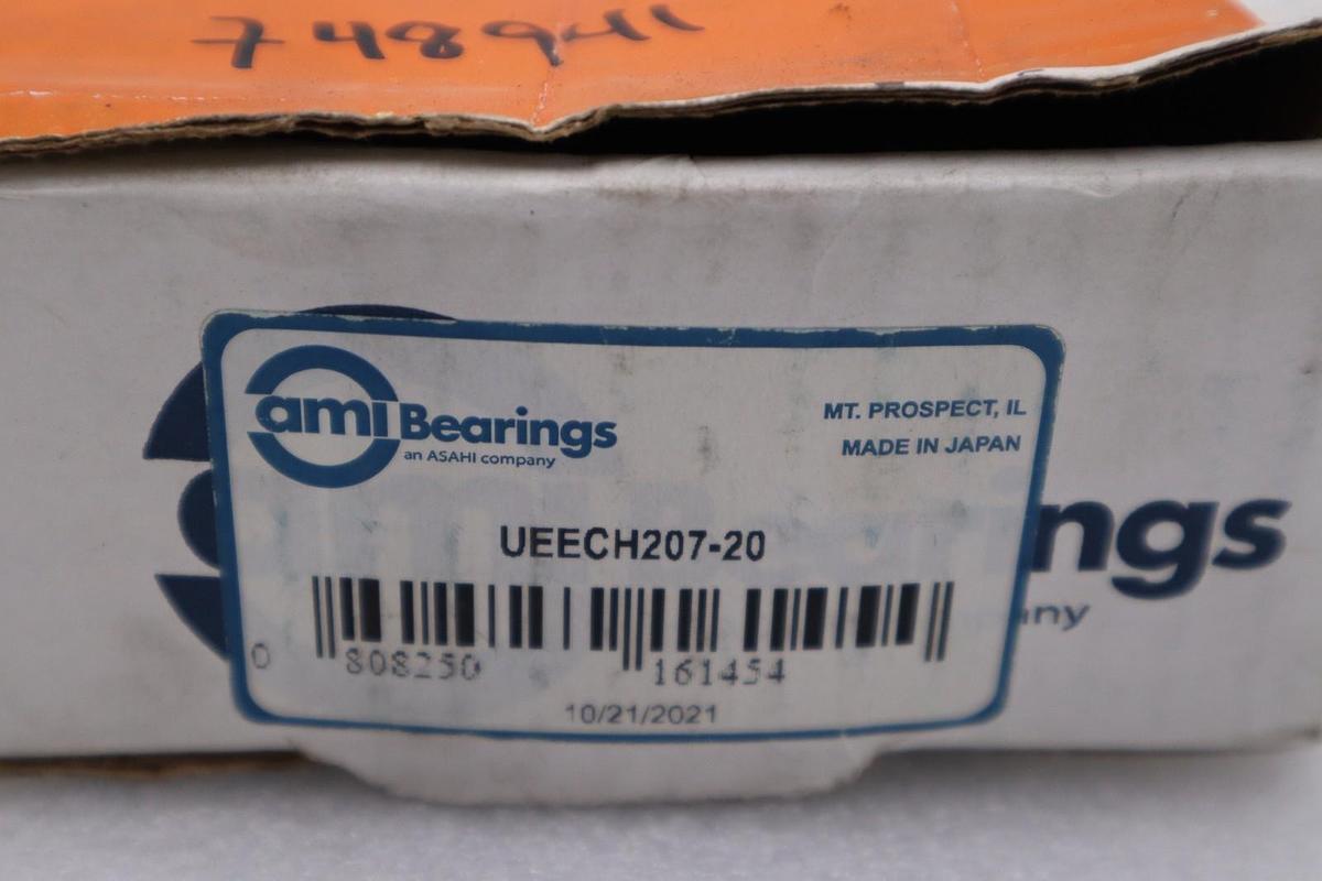 Used UEECH207-20 - AMI - WIDE ACCU-LOC HANGER BEARING STOCK H906A