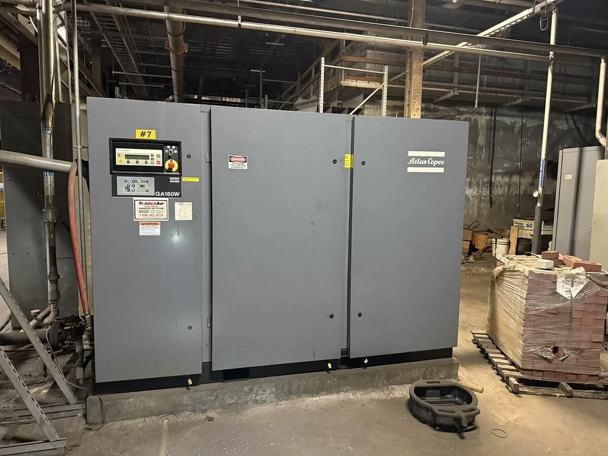 Used 215 HP ATLAS COPCO GA160W AIR COMPRESSOR WITH ALLEN BRADLEY VFD