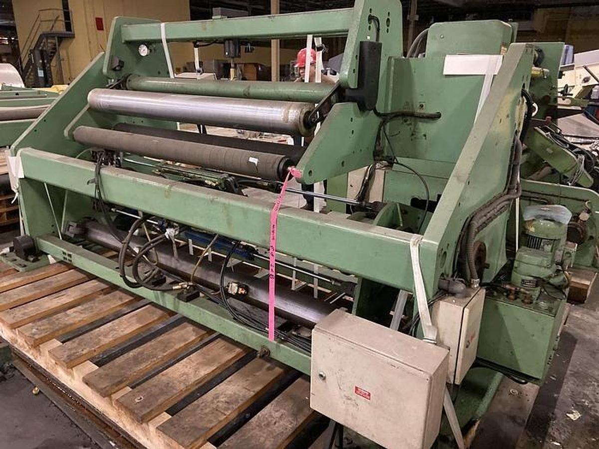 Used 65" TITAN ATLAS SHAFTLESS FLOOR PICK UP UNWIND STAND