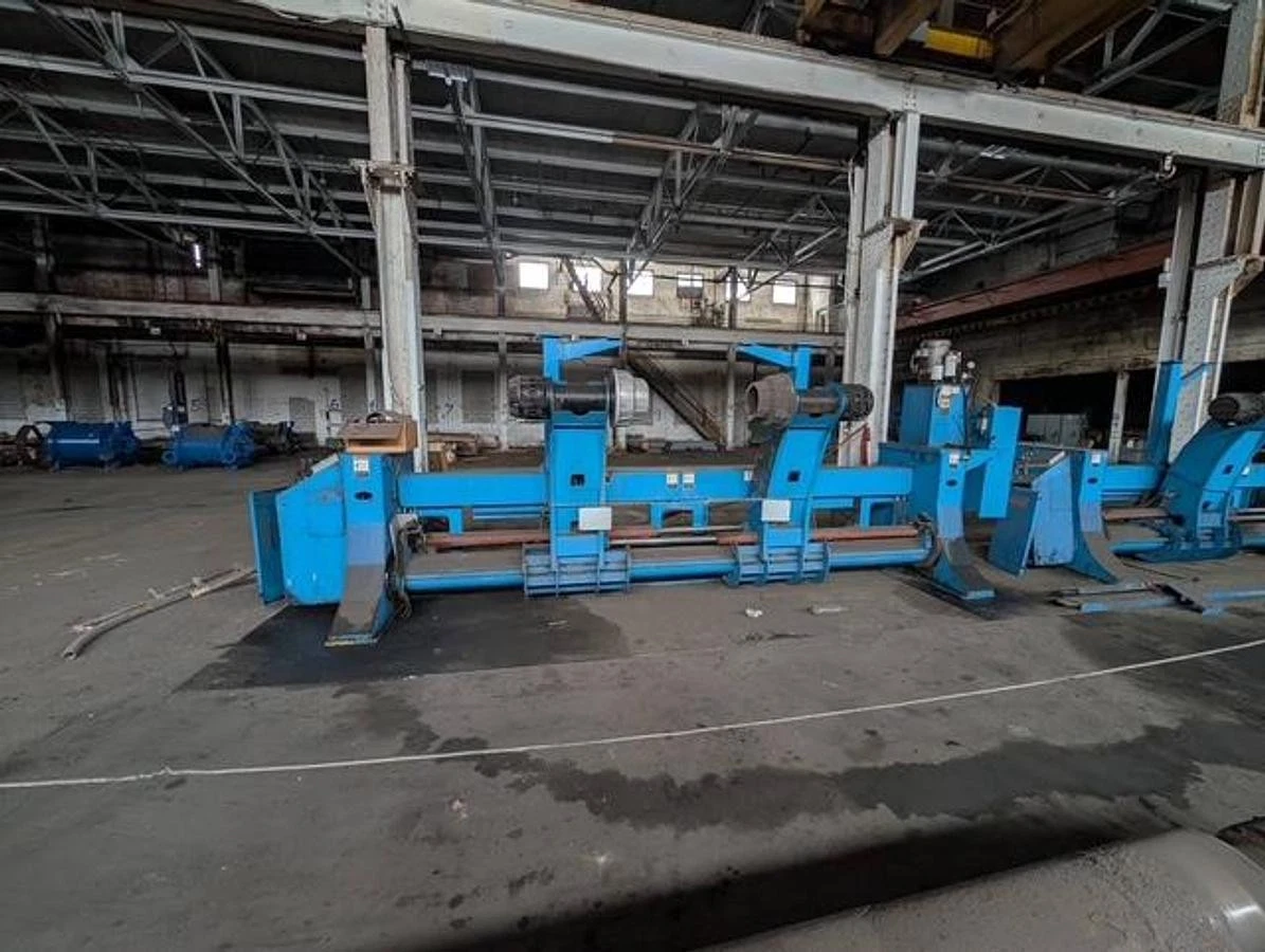 Used 98" WIDE MARQUIP 84" DIAMETER SHAFTLESS FLOOR PICKUP UNWIND STAND BACKSTAND