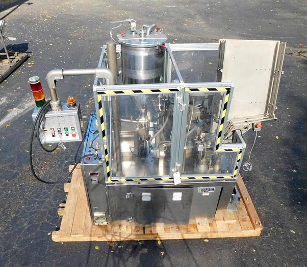Used COMADIS C 100 S METAL TUBE FILLER