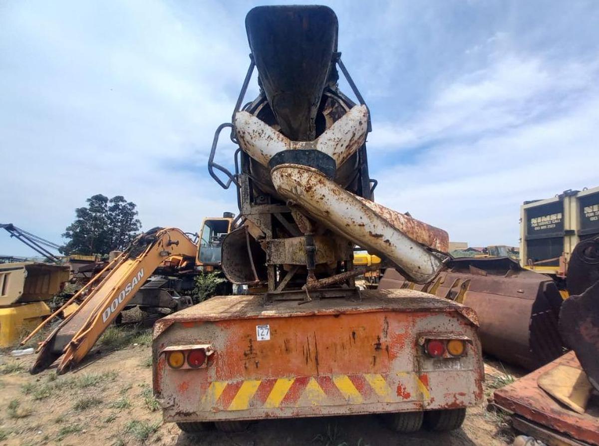 Used SIX CUBE READY-MIX CONCRETE MIXER ON TRAILER WITH DIESEL MOTOR AND HYDRAULIC DRIVES