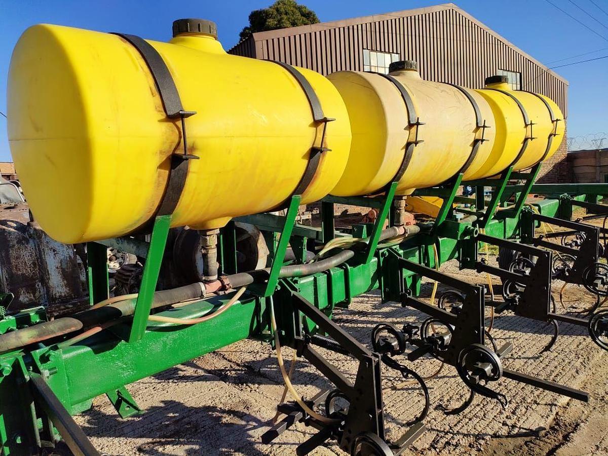 Used 12 ROW SPRING DISK PLOW WITH LIQUID FERTILIZER TANK INDUSER (NOT TESTED)