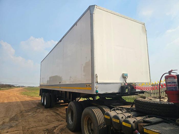 Used HENRED FRUEHAUF DOUBLE AXLE INSOLATED BODY TRAILER WITH RAVIOLI TAIL LIFT