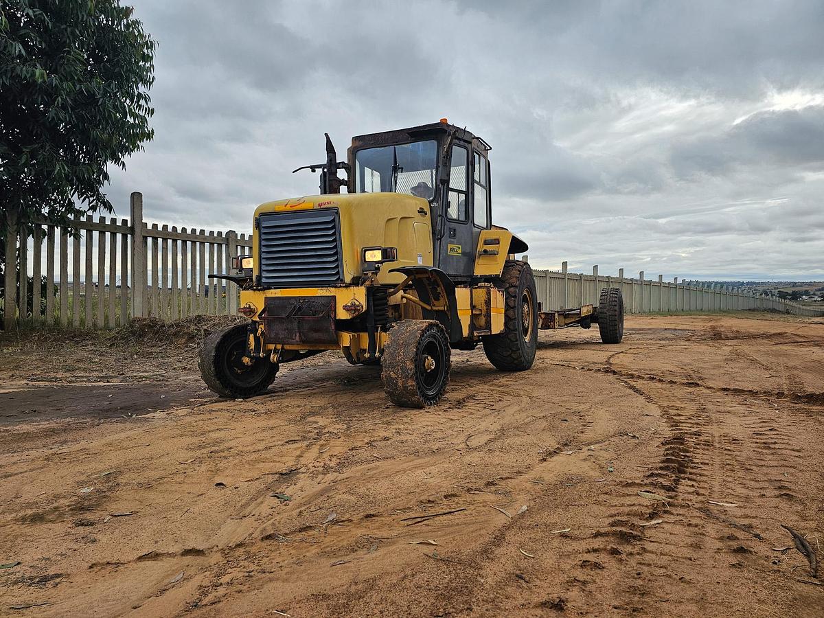 Used BELL TRACTOR WITH TRAILER