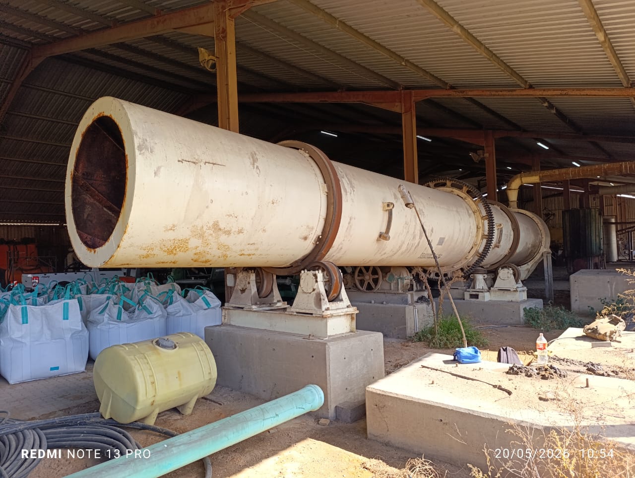 Used ROTATING DRUM COOLER WITH BAG FILTER CHUTE WITH FRAME & GALVANIZED DUCTING PIPES
