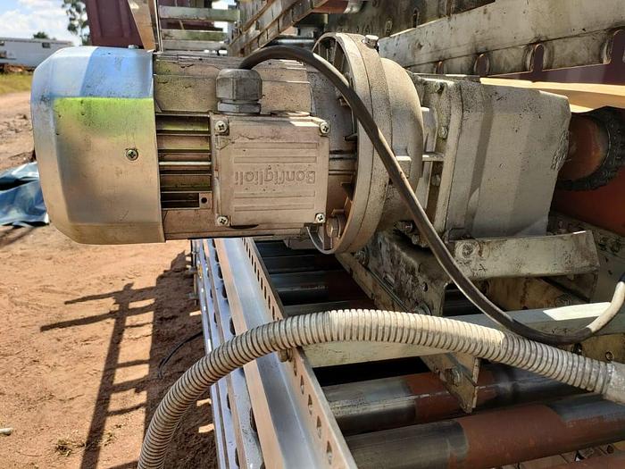 Used 1 X 100 M PACKING LINE ROLLER CONVEYOR STRUCTURE COMPLETE WITH DRIVES UNIT (TESTED)