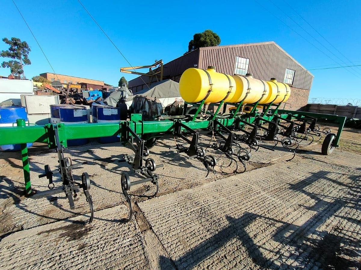 Used 12 ROW SPRING DISK PLOW WITH LIQUID FERTILIZER TANK INDUSER (NOT TESTED)