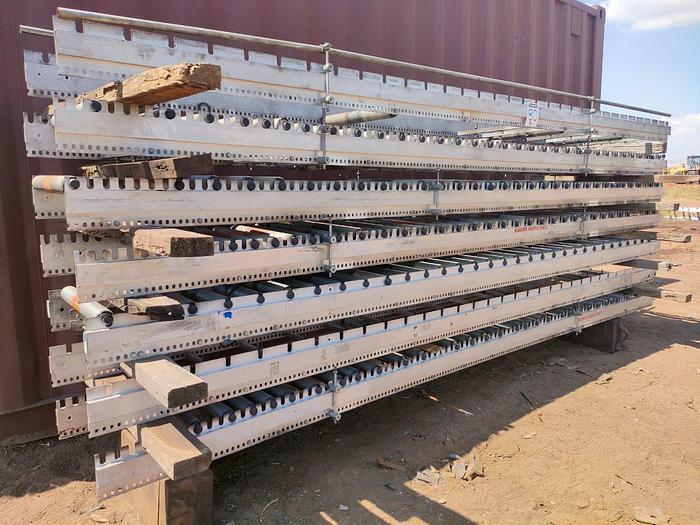 Used 1 X 100 M PACKING LINE ROLLER CONVEYOR STRUCTURE COMPLETE WITH DRIVES UNIT (TESTED)