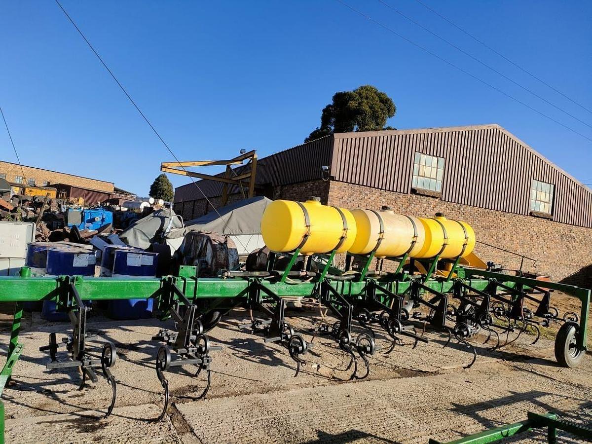 Used 12 ROW SPRING DISK PLOW WITH LIQUID FERTILIZER TANK INDUSER (NOT TESTED)